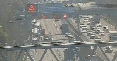 Two people taken to hospital after crash involving van and tanker - which saw section of M60 closed for hours