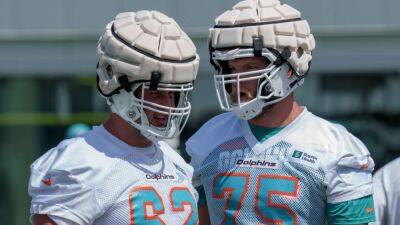 Concussions among players who wore Guardian Caps over summer dropped more than 50%, NFL says - espn.com