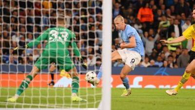 Haaland soars for City in Champions League; Madrid, PSG win