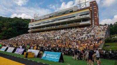 Multiple Appalachian State fans suffer injuries rushing field after Hail Mary win: Report - foxnews.com - Usa - state North Carolina - state Texas