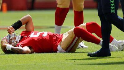 San Francisco 49ers' Trey Lance carted off with ankle injury as Jimmy Garoppolo comes on against Seattle Seahawks