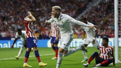 Real Madrid beat Atletico to return to La Liga top spot in derby marred by racist chants