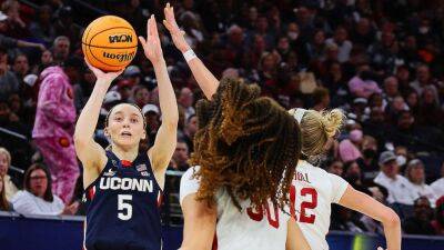 Injured UConn women's basketball star Paige Bueckers to bypass early WNBA draft entry, return to Huskies for 2023-24 season