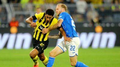 Dortmund scrape past Hoffenheim to top Bundesliga