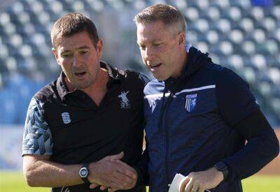 Fans react angrily at Priestfield following a poor Gillingham performance against Mansfield Town; Manager Neil Harris responds to the criticism