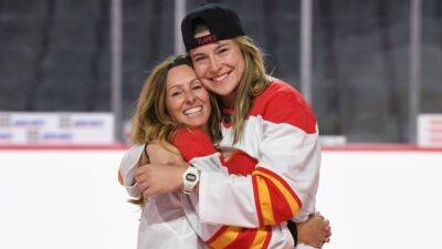 Matthew Tkachuk - After months of planning, Flames fan pulls off 'perfect' proposal at Saddledome - cbc.ca