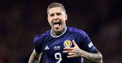 Substitute Lyndon Dykes heads in late double as Scotland beat Ukraine