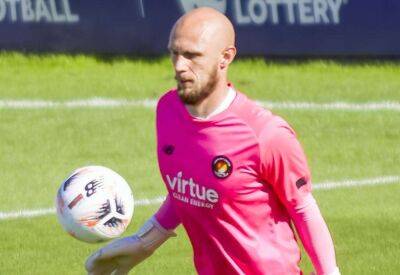 Interaction with his defenders ensures goalkeeper Mark Cousins stays alert despite Ebbsfleet United's early-season dominance