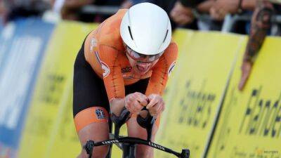 Van Vleuten snatches road race world title after hellish ride