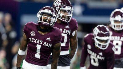 No. 23 Texas A&M's fumble recovery handed off for touchdown propels Aggies over No. 10 Arkansas - foxnews.com -  Sander - state Texas - county Arlington - state Arkansas