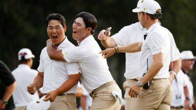 Tom Kim leads International team fightback at Presidents Cup but US still in command