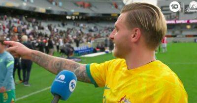 Jason Cummings in hilarious post match soaking as Australia teammates derail interview after debut goal