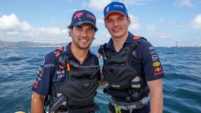 Red Bull F1 drivers Max Verstappen and Sergio Perez swap wheels for water with Oracle SailGP team