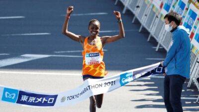 World record holder Kosgei withdraws from London Marathon with injury - channelnewsasia.com -  Chicago - county Marathon