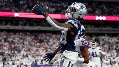 NFL: Dallas Cowboys' Lamb puts shoulder to the wheel to bring down New York Giants
