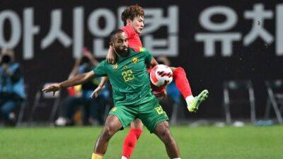Son's header lifts South Korea past Cameroon