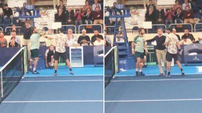 Shocking moment tennis players Adrian Andreev and Corentin Moutet almost come to blows on court in France
