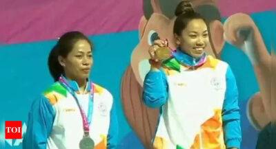 Weightlifting at National Games: Mirabai pips Sanjita for 49kg gold - timesofindia.indiatimes.com - Birmingham