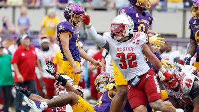 East Carolina kicker's rough day keeps Pirates from upsetting No. 13 NC State - foxnews.com - state North Carolina - county Greenville