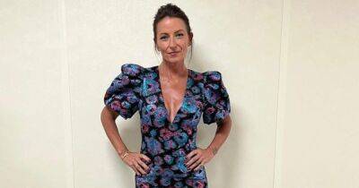 Davina McCall 'looks 25' as she sizzles in plunging mini dress as boyfriend helps her get ready for The Masked Dancer