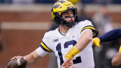 Michigan coach Jim Harbaugh staying the course, giving Cade McNamara, J.J. McCarthy each a start as Wolverines' quarterback battle continues