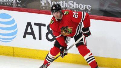 Connolly signs in Switzerland after buyout from Blackhawks