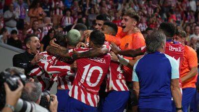 Atletico Madrid 2-1 Porto: Antoine Griezmann scores third goal of injury time to steal win for hosts