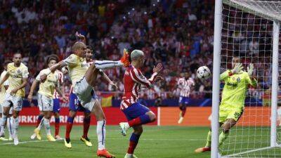 Last-gasp Griezmann goal gives Atletico win over 10-man Porto