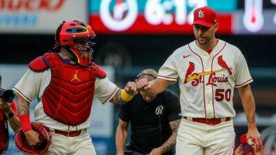 Cardinals' Yadier Molina hits two home runs in historic day alongside longtime battery mate Adam Wainwright