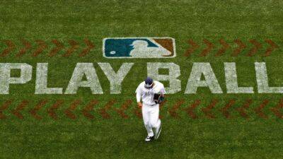 Major League Baseball passes significant rules changes including pitch clock, banning defensive shifts