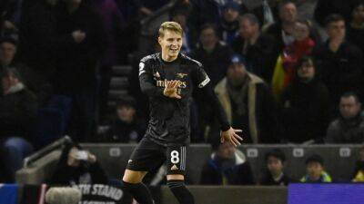 Kevin De-Bruyne - Martin Odegaard - Gabriel Martinelli - Paul Merson - Decisive Odegaard leads from front as Arsenal scale new heights - channelnewsasia.com - Manchester - Spain - Norway