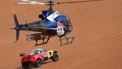 Five-in-a-row lifts Sebastien Loeb into Dakar Rally top two