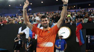 Djokovic 'emotional' after warm welcome at Melbourne Park