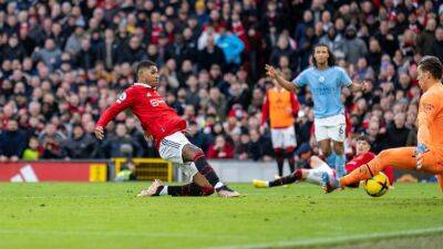 United strike late to sink City in Manchester derby