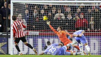 Mark Travers drops to Bournemouth bench as Brentford triumph