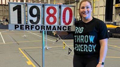 Sarah Mitton improves indoor shot put record for Canadian women to 19.80 metres