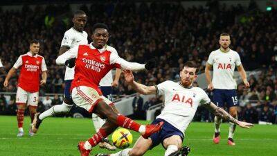 Classy Arsenal outgun Spurs to extend lead at the top