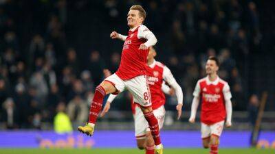 Arsenal outclass Tottenham in north London derby to move eight clear at the top of the Premier League