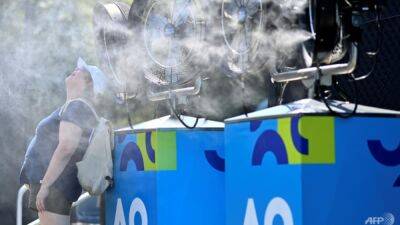 Play to resume on outside courts at Australian Open after extreme heat break