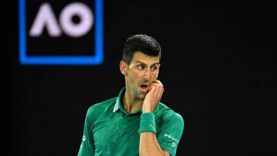 Djokovic, Murray triumph as weather plays havoc at Australian Open