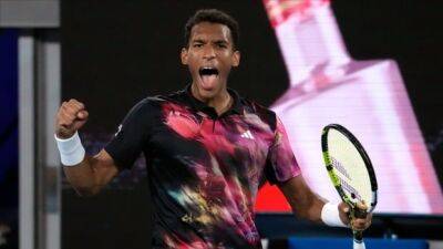 Auger-Aliassime rallies past Molcan, claims 5-set victory in 2nd round of Australian Open