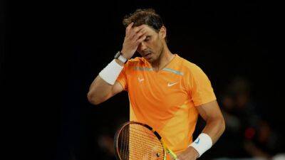 Ailing Nadal bows out of Australian Open, rain causes havoc