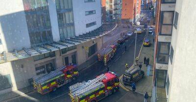Large number of emergency services called to landmark tower block as 'smoke visible' - Live updates