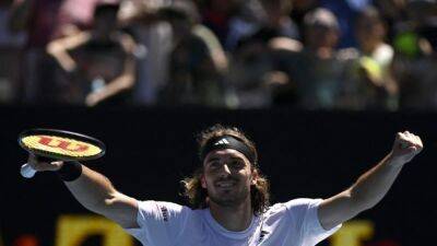 Sun shines on Tsitsipas, Swiatek at Australian Open