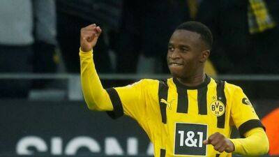 Dortmund extend deal with teenage striker Moukoko to 2026