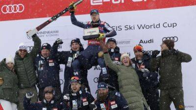 Alpine skiing-Kilde wins in Kitzbuehel as Feuz says farewell