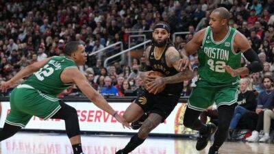 NBA roundup: Celtics run win string to nine by edging Raptors