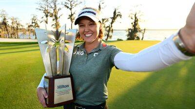 Henderson eases to Orlando win, Maguire inside top 10