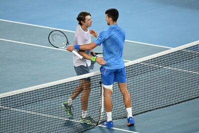 Djokovic crushes De Minaur to fire warning at Australian Open