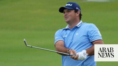 Reed fares better than McIlroy after delayed start in Dubai
